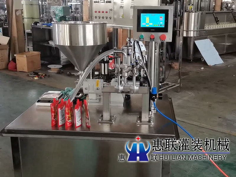 半自動轉子泵自立袋灌裝機